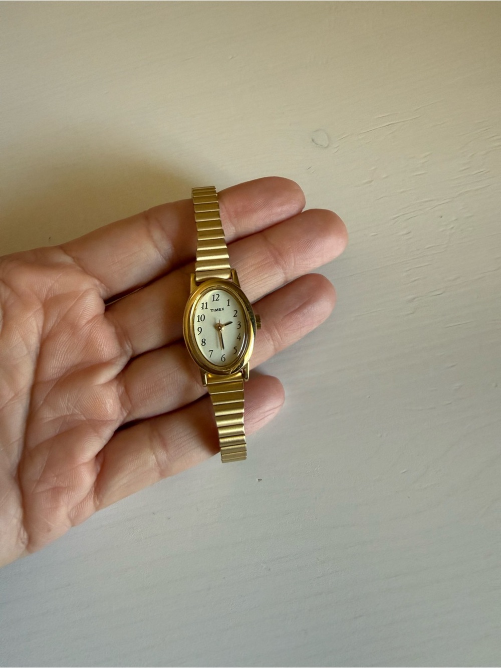 Timex Gold Tone Oval Dial Stretch Bracelet Watch with White Face